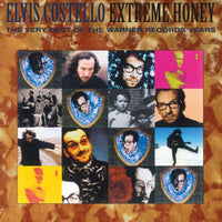 
              Elvis Costello Extreme Honey: The Very Best Of The Warner Records Years (Limited Edition, 180 Gram Vinyl, Colored Vinyl, Gold) [Import] (2 Lp's) - Vinyl
            