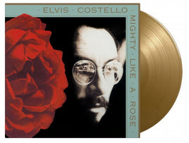 Elvis Costello Mighty Like A Rose (Limited Edition, 180 Gram Vinyl, Colored Vinyl, Gold) [Import] - Vinyl